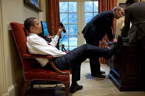 Barack Obama, putting his feet up on furniture in the White House